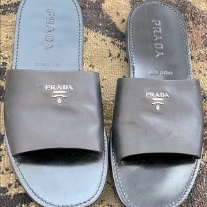 Authentic Prada logo slip-ons